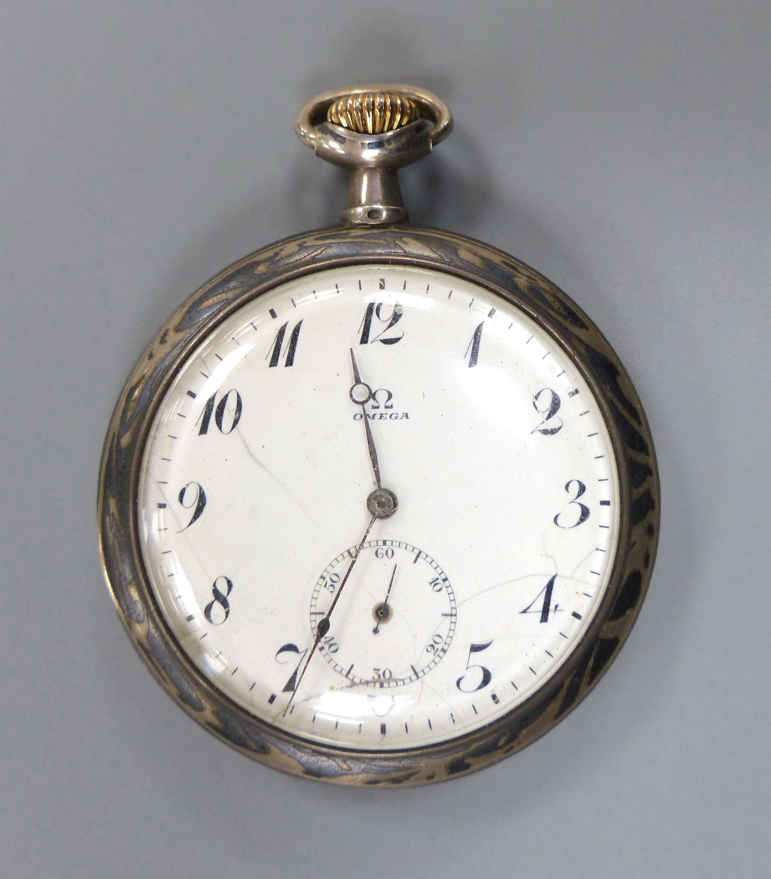 An early 20th century white metal and niello Omega open face keyless pocket watch, dial a.f.,